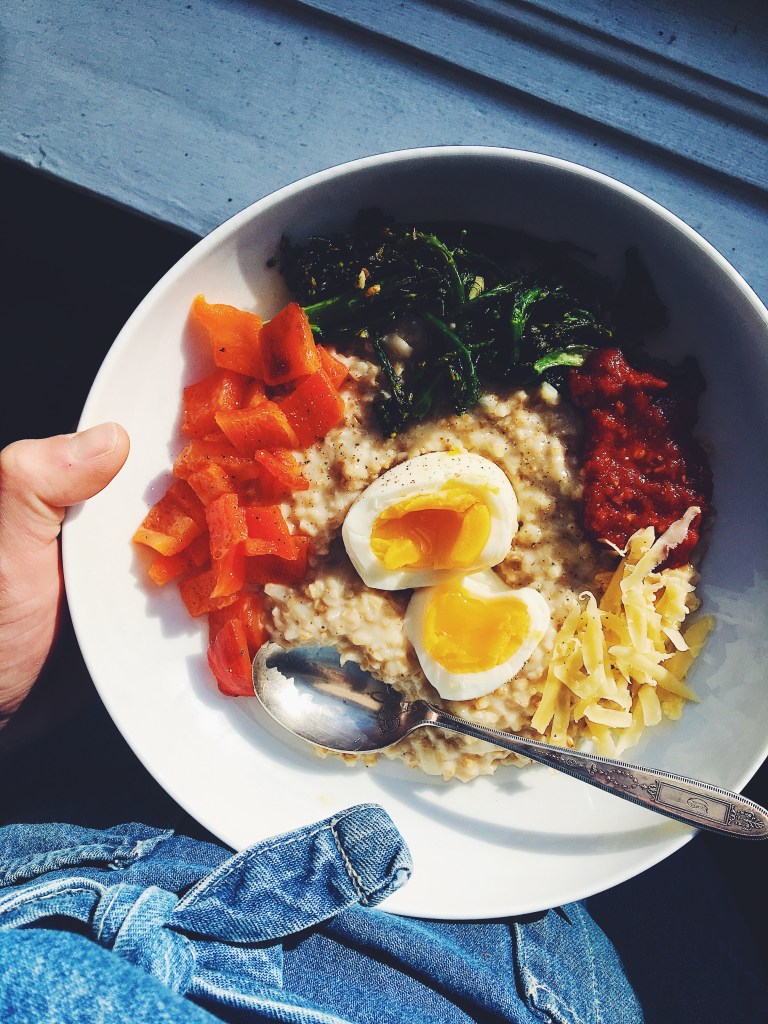 Cheesy Oatmeal with Romesco Sauce, Garlic Broccolini, and Eggs